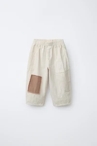 PANTALON BAGGY RUSTIQUE AVEC PIÈCES