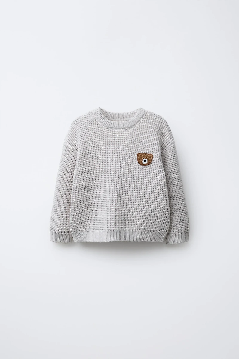WAFFLE KNIT TEDDY BEAR PATCH SWEATER