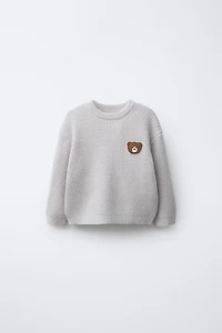 WAFFLE KNIT TEDDY BEAR PATCH SWEATER