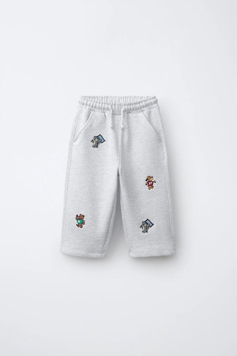 EMBROIDERED ANIMAL PLUSH JOGGERS