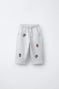 EMBROIDERED ANIMAL PLUSH JOGGERS