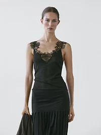 Strappy knit top with lace trim detail