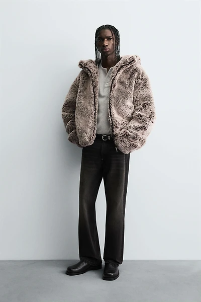 BLOUSON EFFET FOURRURE À CAPUCHE