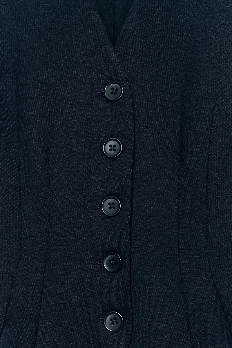 INTERLOCK BUTTON VEST