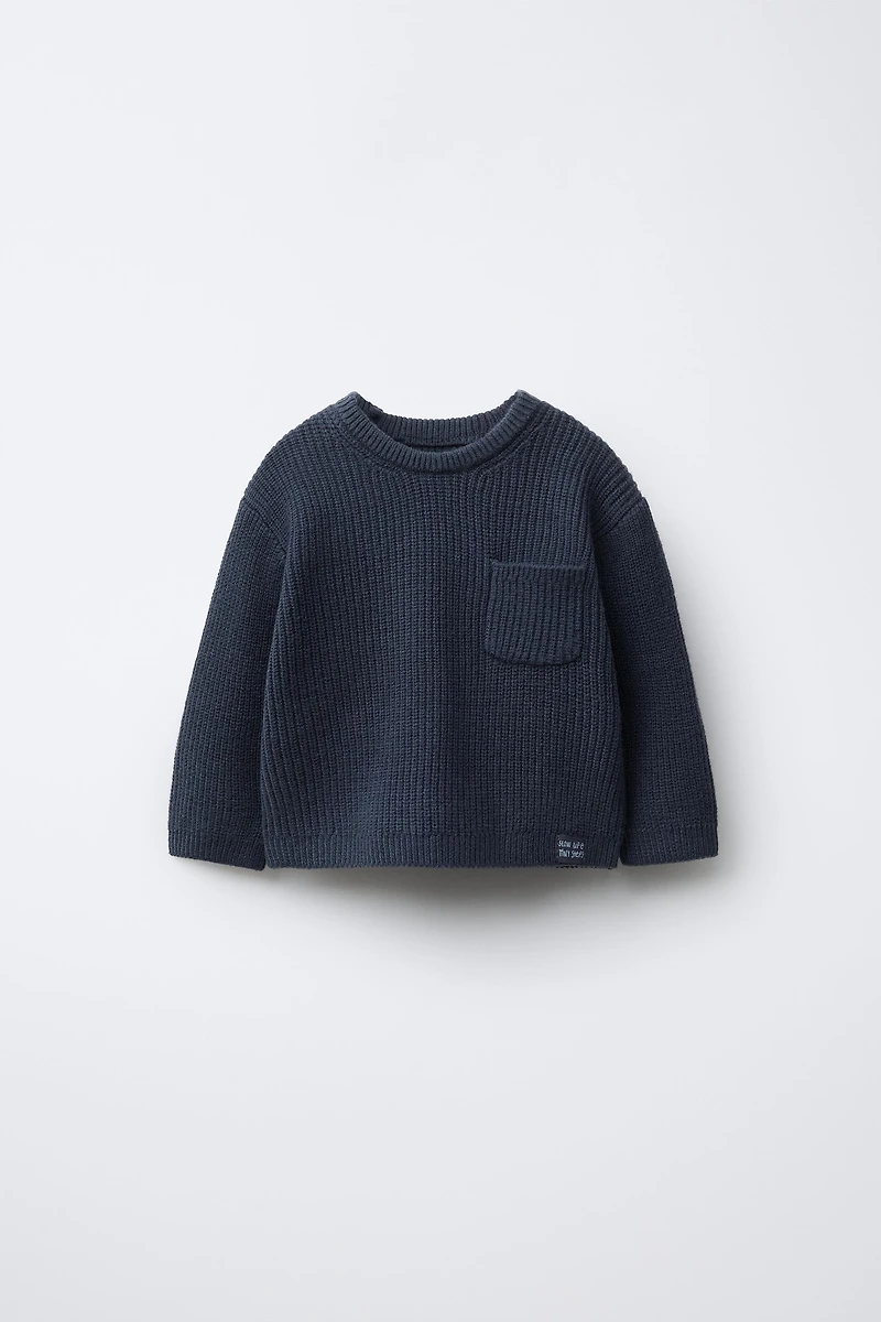 PULL EN MAILLE PERLÉE AVEC POCHE
