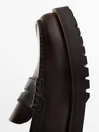 Moc toe loafers with track sole