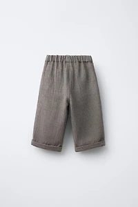 RUSTIC BAGGY PANTS WITH BUTTONS AND WOOL