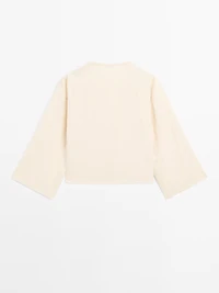 Long sleeve blouse with side button fastening
