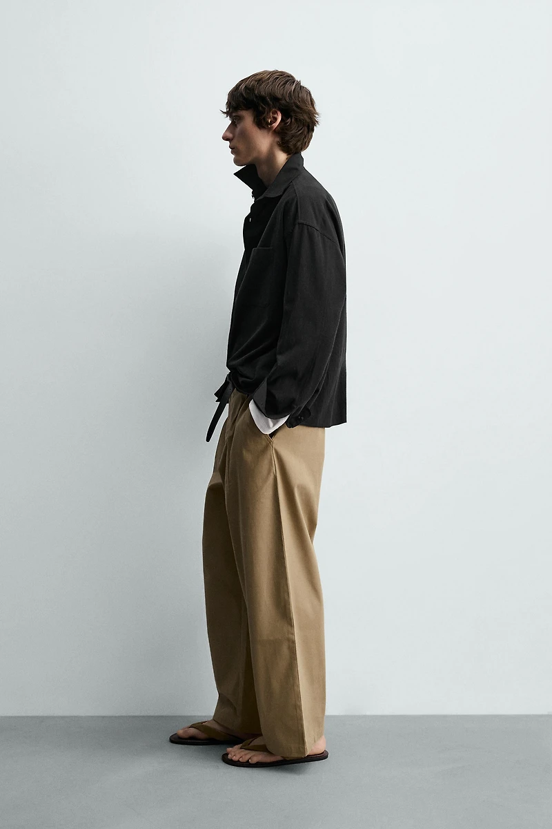 PANTALON COUPE LARGE À PLIS
