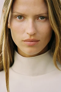 ASYMMETRIC INTERLOCK CAPE