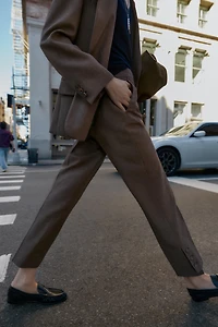 PANTS WITH BUTTONED HEM