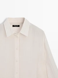 Flowing shirt with pleated detail