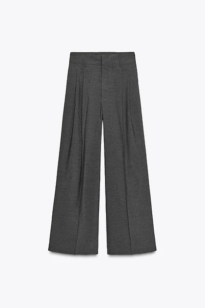 PANTALON À PINCES ET RABATS