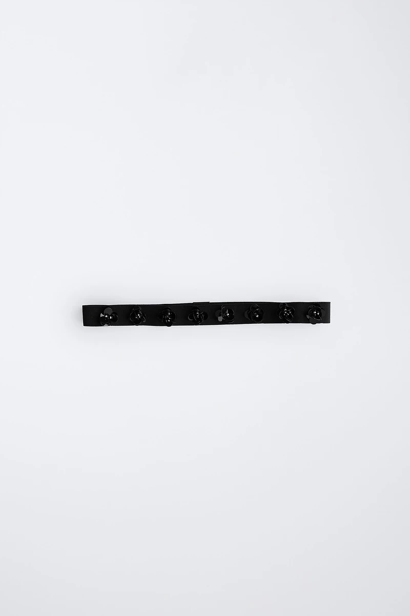 SERRE-TÊTE ÉLASTIQUE À FLEURS