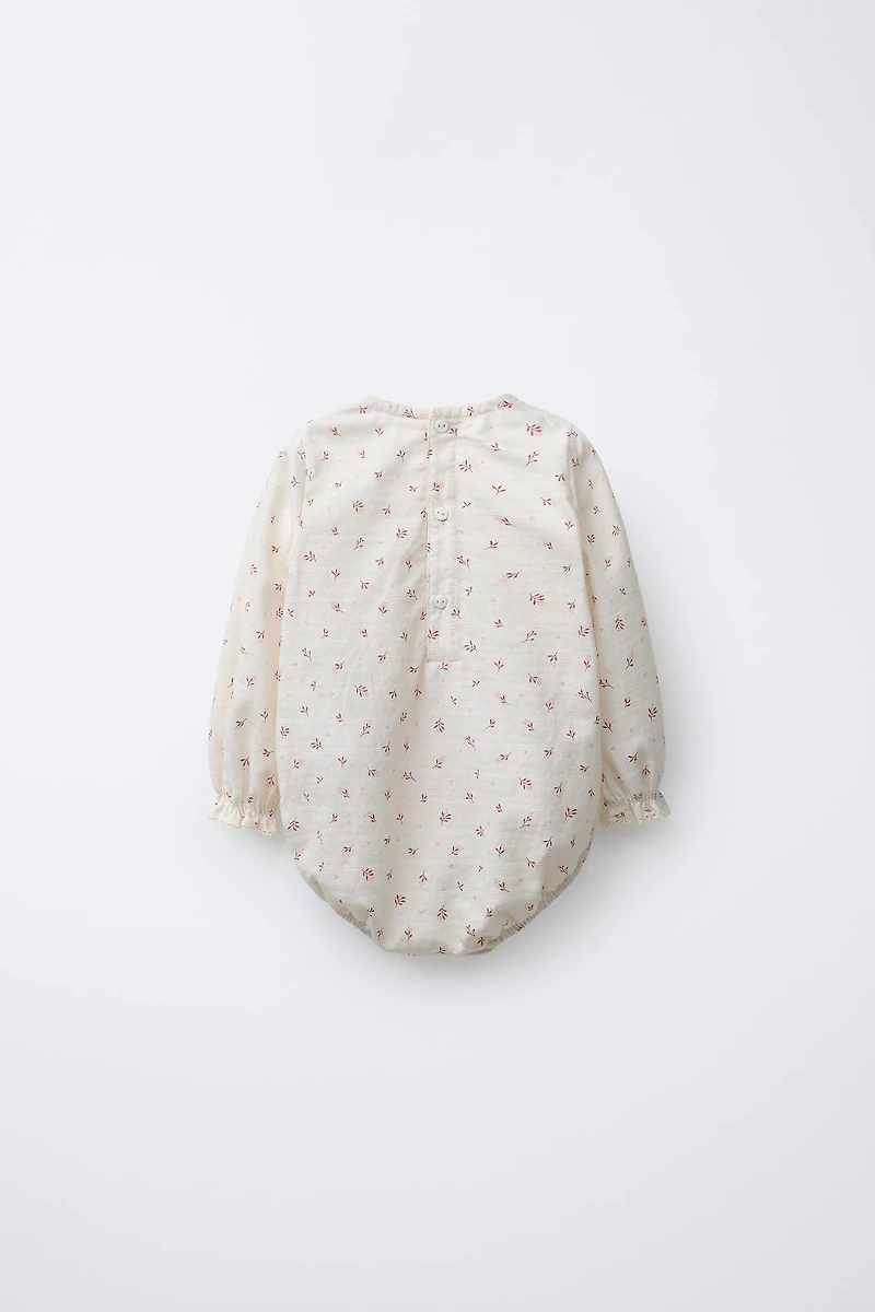 LACE TRIM FLORAL BODYSUIT