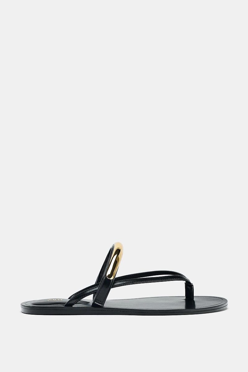 SANDALS WITH METALLIC APPLIQUÉ