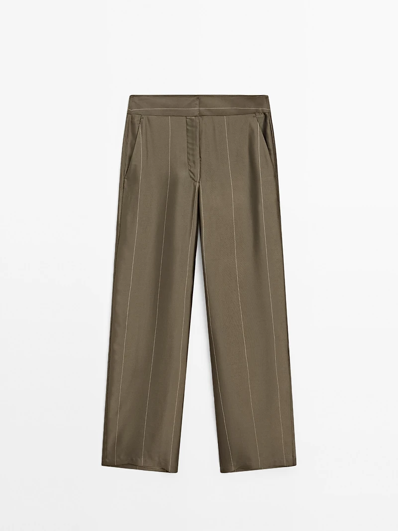 Flowing trousers with striped details