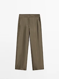 Flowing trousers with striped details