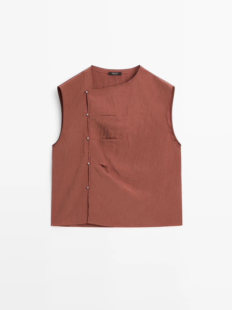 Blouse boutonnage côté argenté
