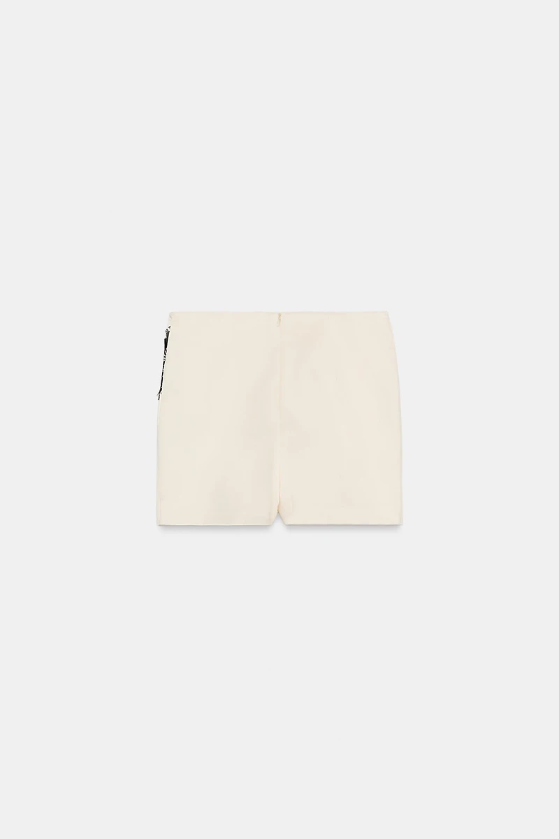 JUPE-PANTALON CROISÉE EN DENTELLE