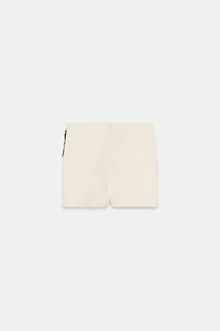 JUPE-PANTALON CROISÉE EN DENTELLE