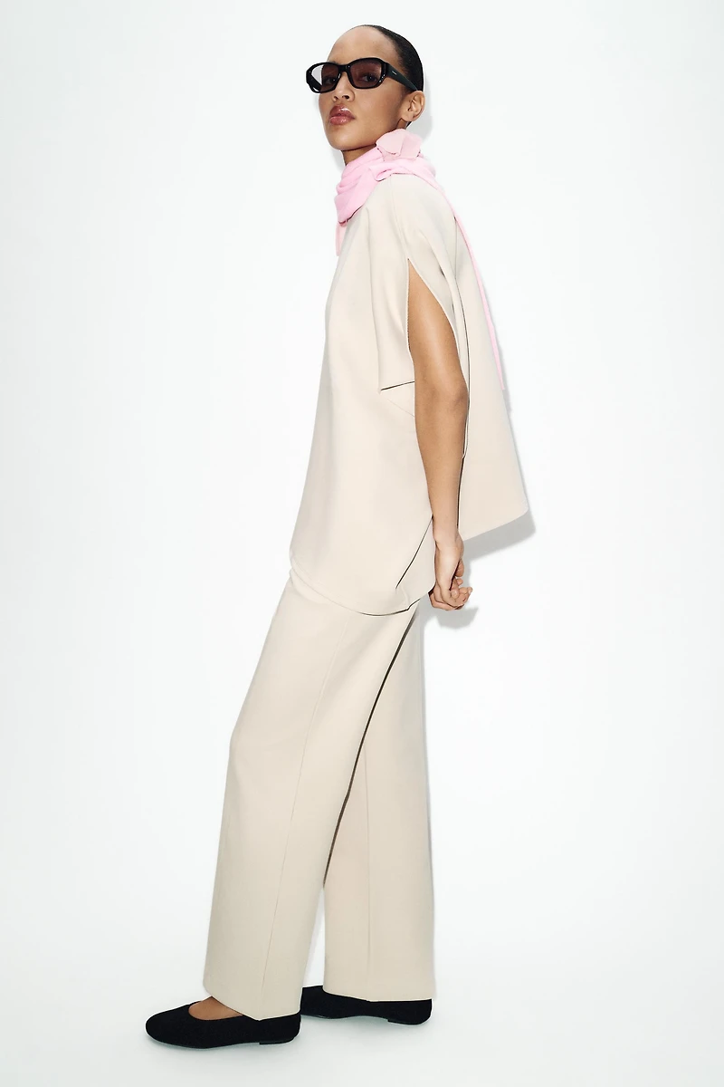 ASYMMETRIC INTERLOCK CAPE