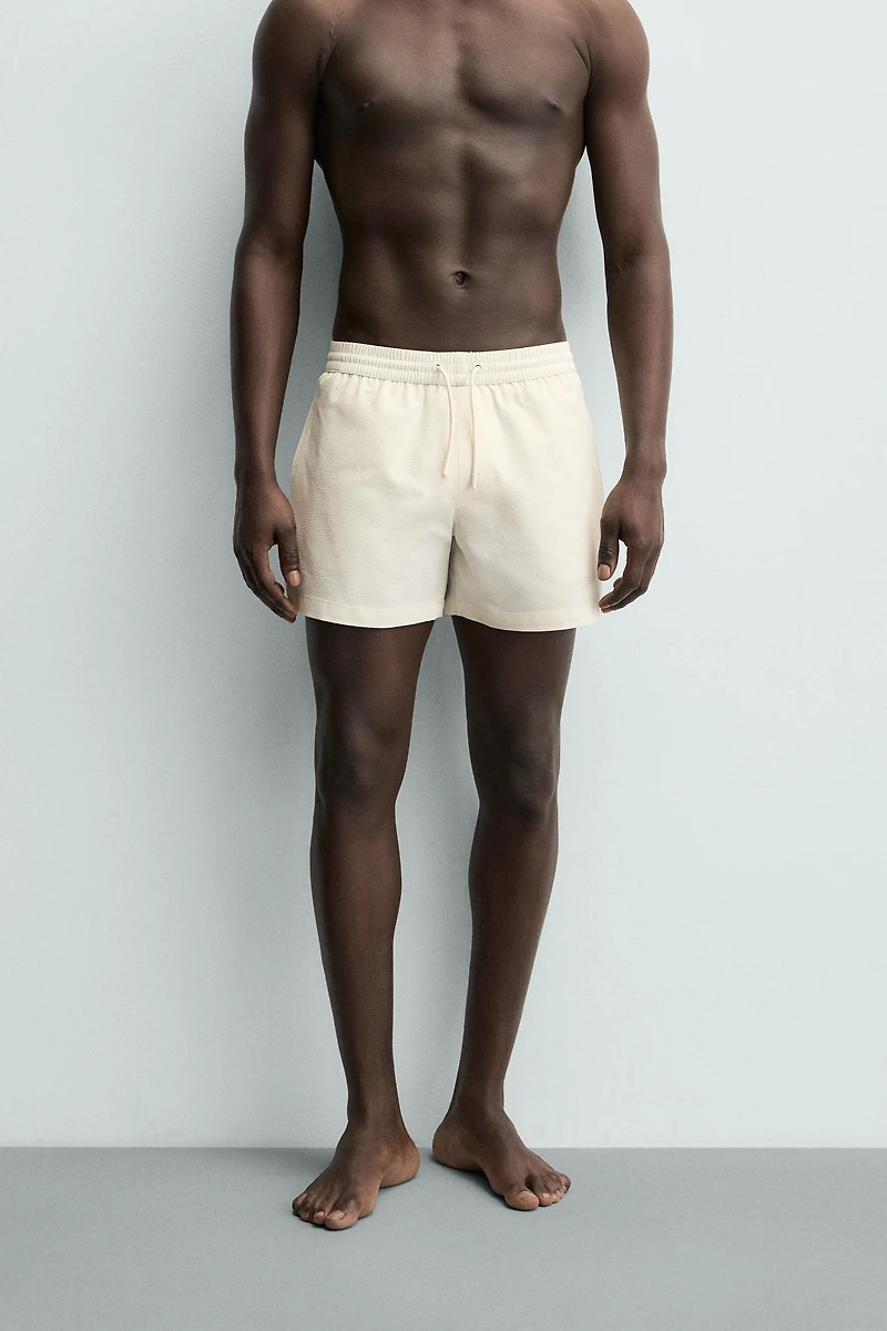SEERSUCKER SWIM TRUNKS