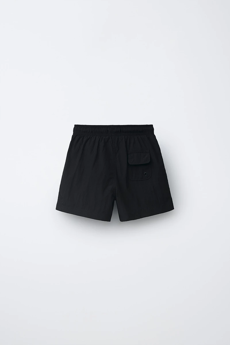 6-14 YEARS/ PLAIN SWIM SHORTS