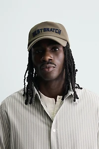 TEXT EMBROIDERED CAP