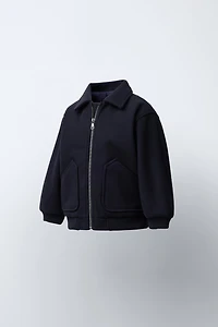 VESTE EN LAINE À POCHES