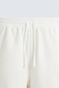 BERMUDA DE JOGGING DÉLAV