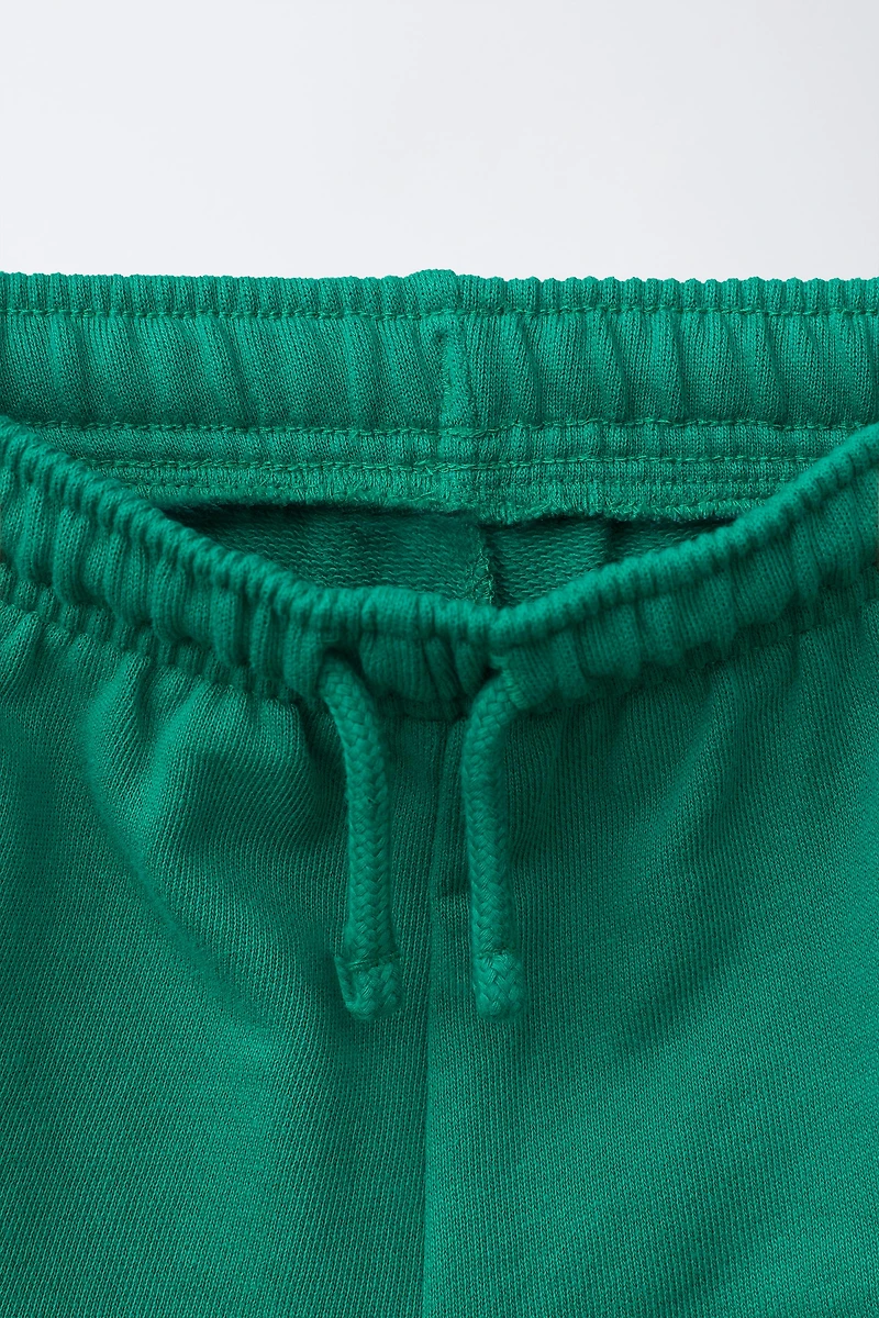 SHORT EN MOLLETON BRODÉ SNOOPY PEANUTS™