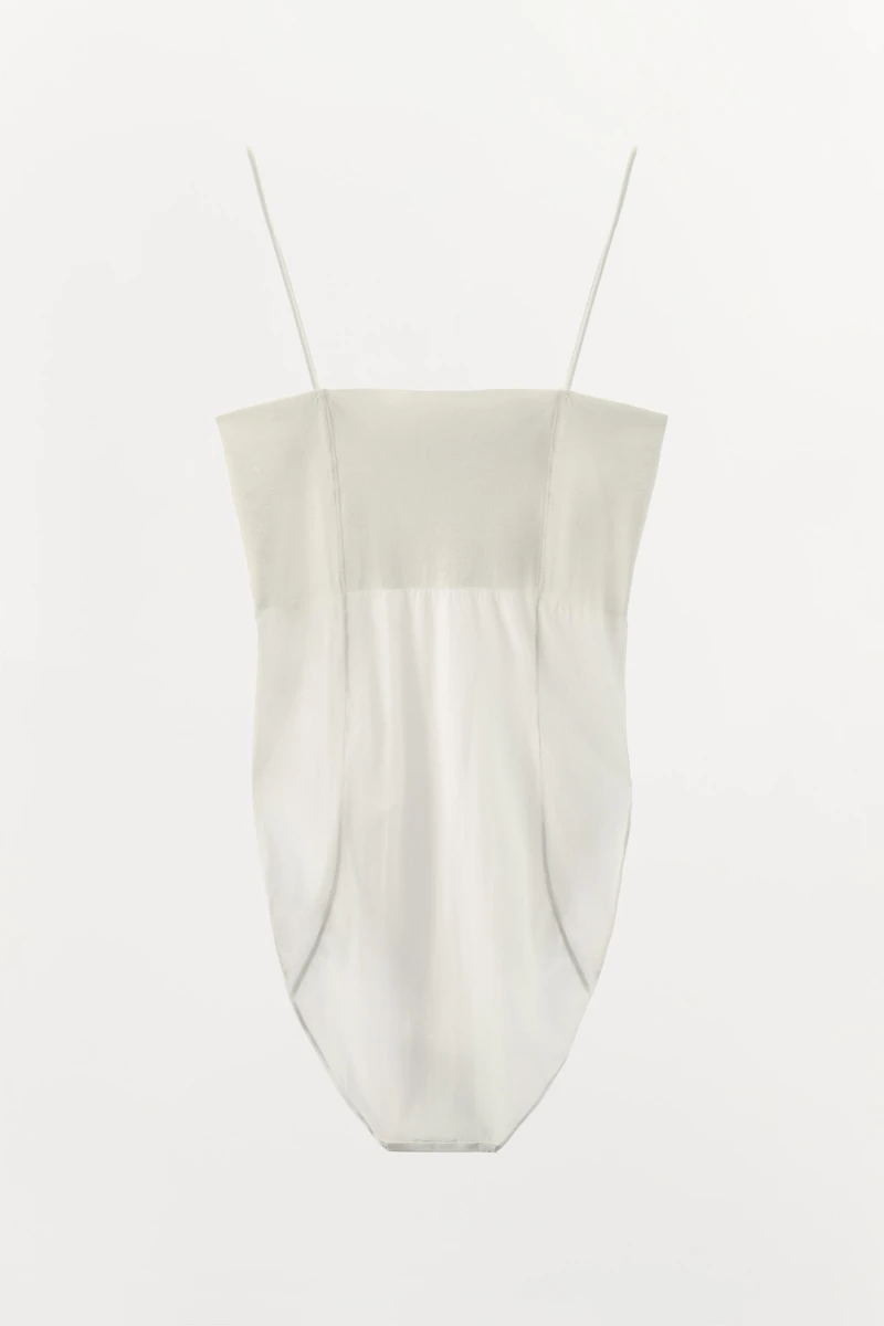 FITTED STRAPPY BODYSUIT WITH SEAMS
