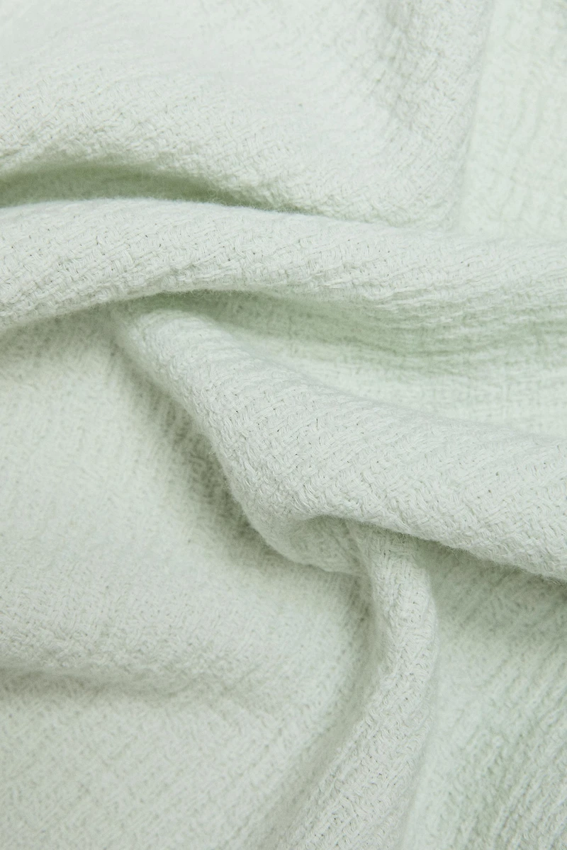 COTTON BLANKET WITH FRINGING
