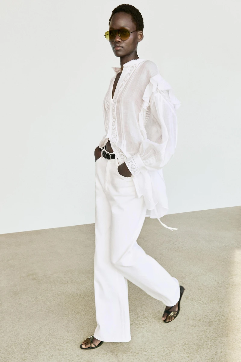 Stand collar blouse with embroidery and ruffles