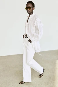 Stand collar blouse with embroidery and ruffles