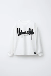 EMBOSSED TEXT T-SHIRT