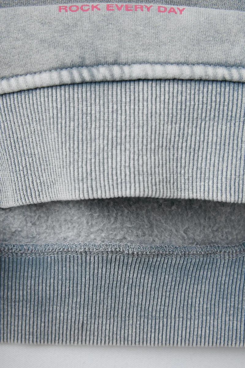 SWEAT EFFET DÉLAVÉ ÉTOILE BRILLANT