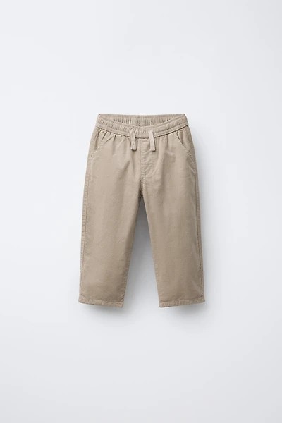 PANTALON EN VELOURS CÔTELÉ FIN DOUBLÉ