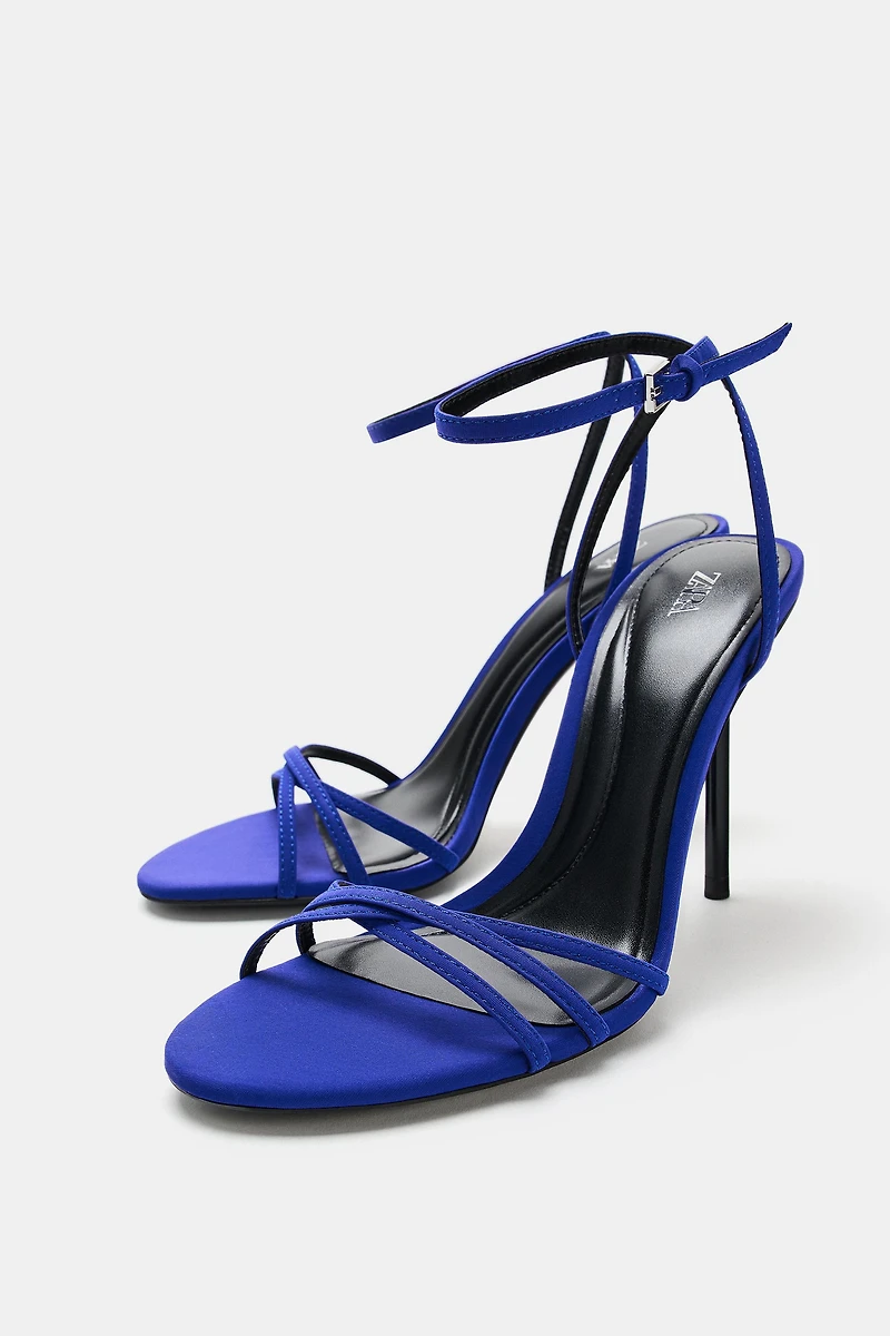 CRISS-CROSS STRAP HEELED SANDALS