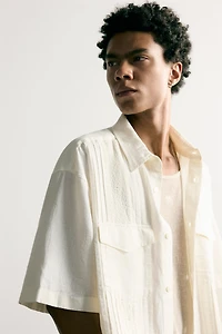 RELAXED FIT EMBROIDERED PLEAT SHIRT