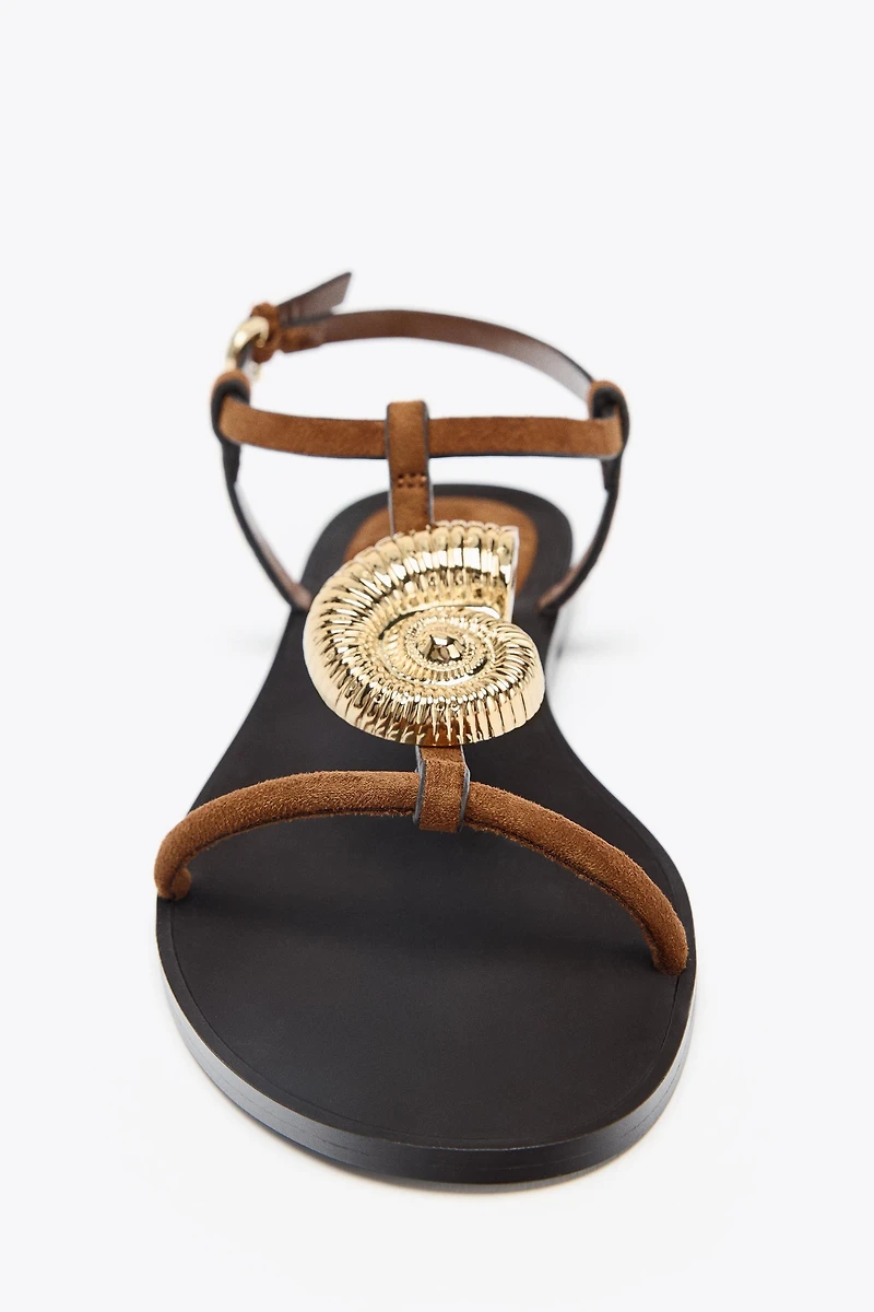 FLAT SANDALS WITH METALLIC TRIM