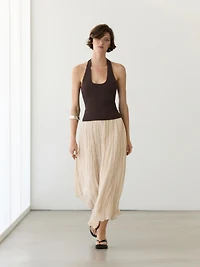 Flowing midi skirt with pleated detail