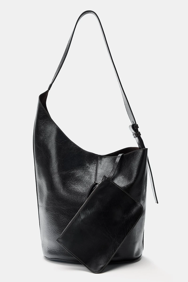 ASYMMETRIC LEATHER BUCKET BAG