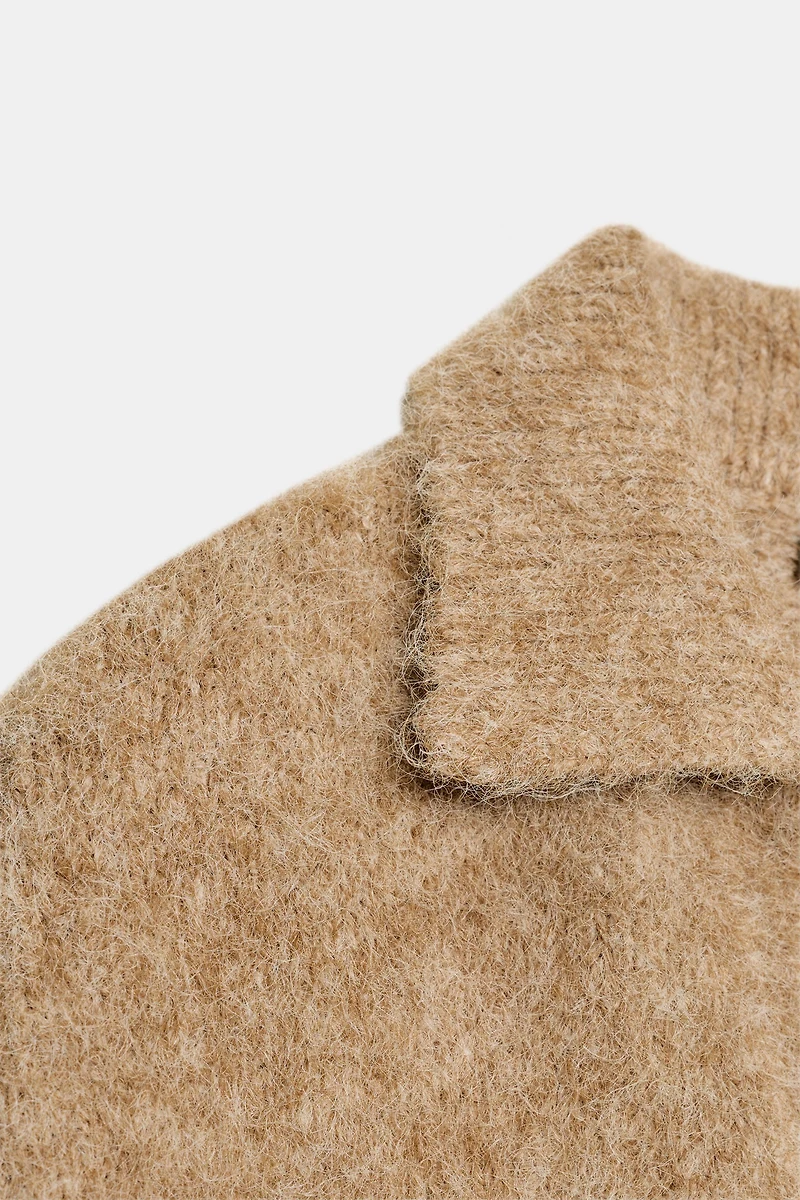 PULL EN MAILLE EFFET BROSS