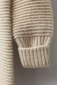 HOODED CHUNKY KNIT JUMPSUIT