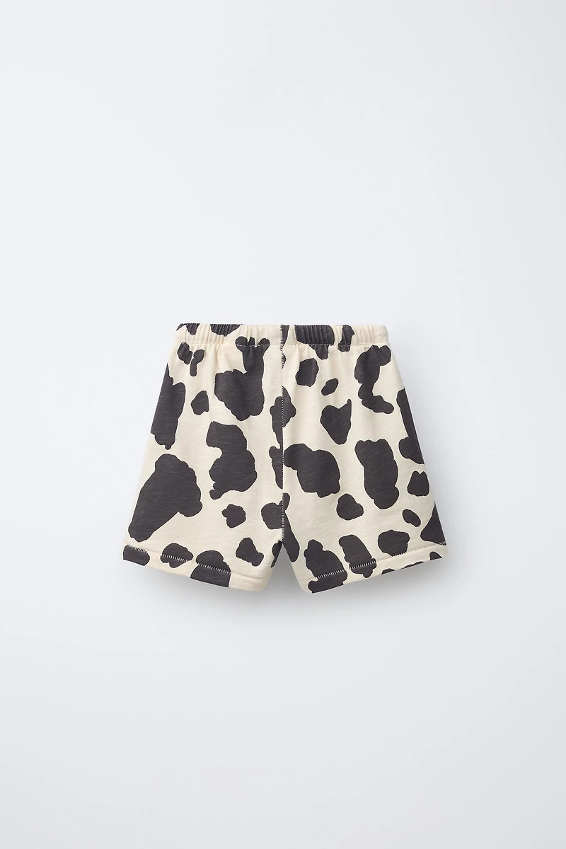 SHORT EN MOLLETON À IMPRIMÉ VACHE