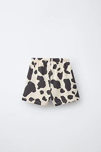 SHORT EN MOLLETON À IMPRIMÉ VACHE