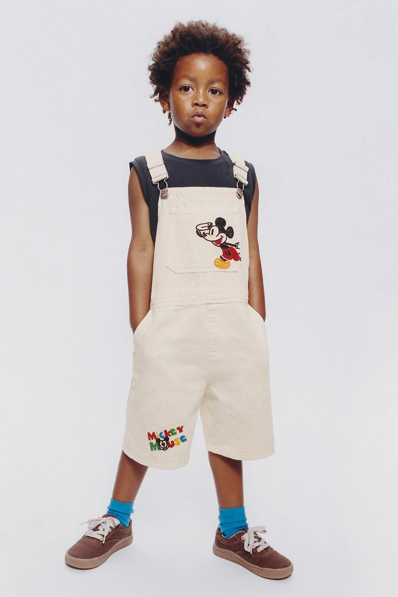 SALOPETTE COURTE EN SERGÉ BRODERIES MICKEY MOUSE © DISNEY