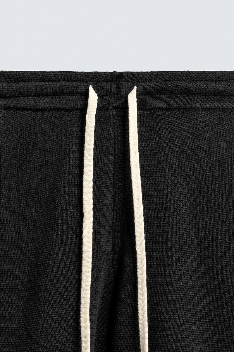 TEXTURED KNIT PANTS
